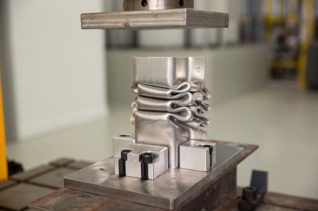 A test sample that underwent the crush test, showing the folding pattern for optimum energy absorption